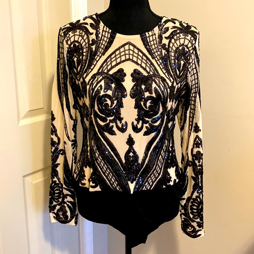 Bodysuit with Black sequins nude underneath